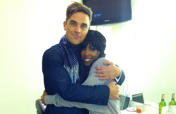 Robbie Williams and Kelly Rowlands pose together backstage of the X Factor (Pic: Twitter)